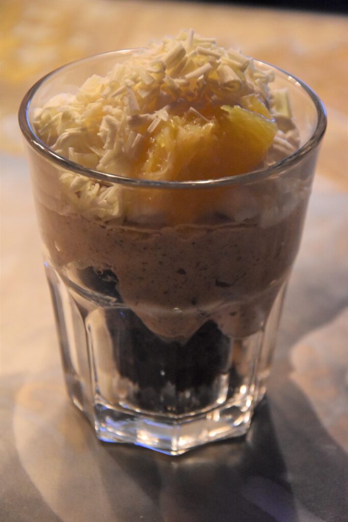 Chocolate-orange trifle with sweet potatoes, served in a glass 