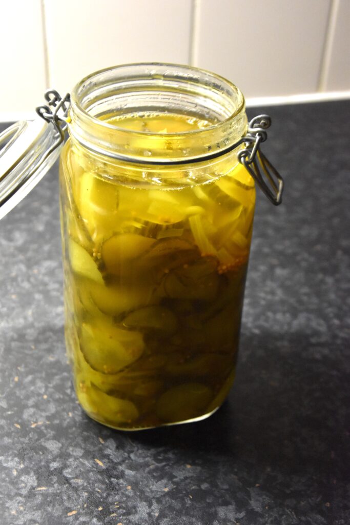 Traditional seasoned cucumbers, in a really large mason jar