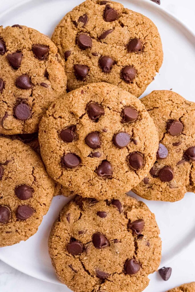 Classic Paleo Chocolate Chip Cookies by Cook At Home Mom, several cookies on top of each other